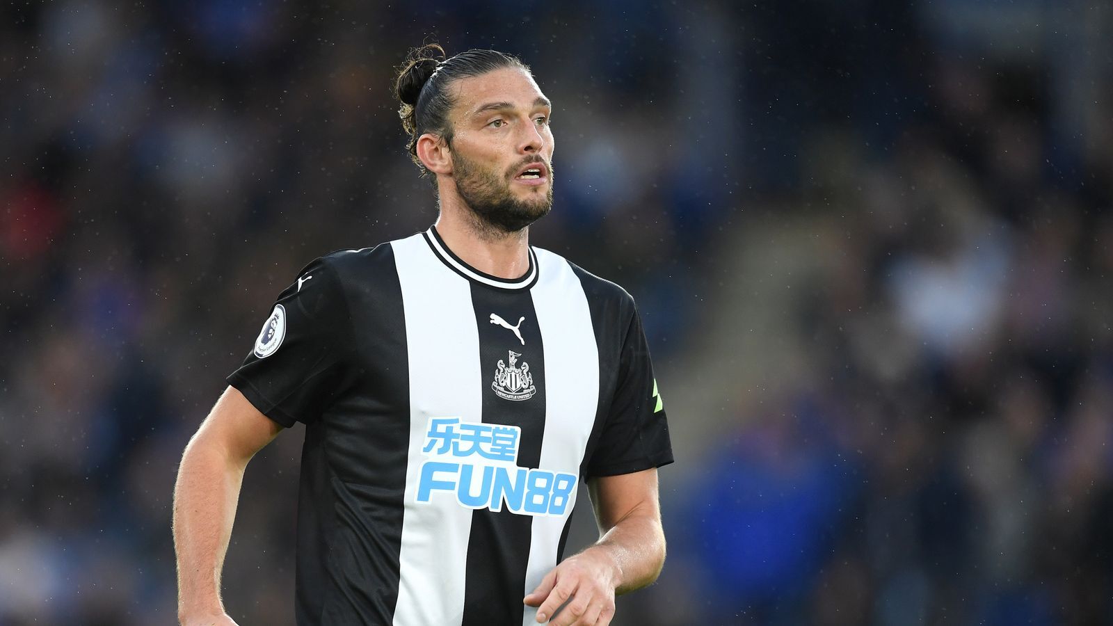 Striker Andy Carroll signed a new contract with Newcastle United